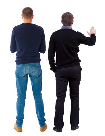 Back view of couple in sweater. beautiful friendly girl and guy together. Rear view people collection. backside view of person. Isolated over white background.の写真素材