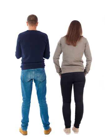 Back view of couple in sweater. beautiful friendly girl and guy together. Rear view people collection. backside view of person. Isolated over white background.の写真素材