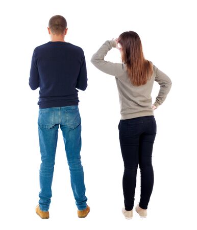 Back view of couple in sweater. beautiful friendly girl and guy together. Rear view people collection. backside view of person. Isolated over white background.の写真素材