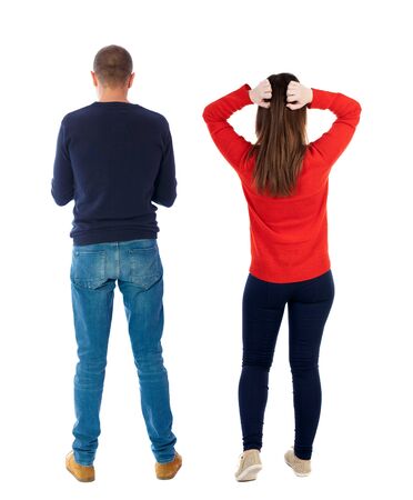 Back view of couple in sweater. beautiful friendly girl and guy together. Rear view people collection. backside view of person. Isolated over white background.の写真素材