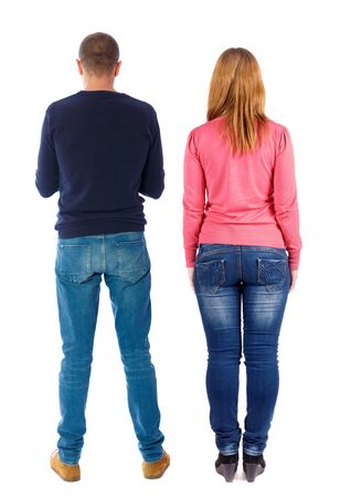 Back view of couple in sweater. beautiful friendly girl and guy together. Rear view people collection. backside view of person. Isolated over white background.の写真素材