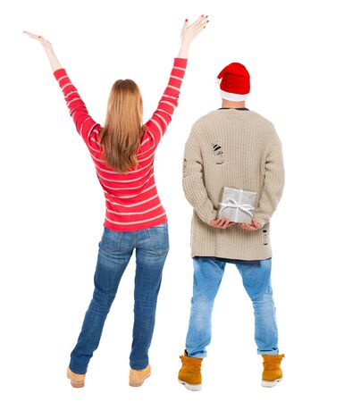 Back view of couple in sweater. beautiful friendly girl and guy together. Rear view people collection. backside view of person. Isolated over white background.の写真素材