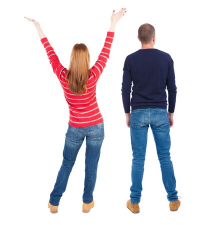 Back view of couple in sweater. beautiful friendly girl and guy together. Rear view people collection. backside view of person. Isolated over white background.の写真素材