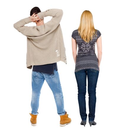 Back view of couple in sweater. beautiful friendly girl and guy together. Rear view people collection. backside view of person. Isolated over white background.の写真素材