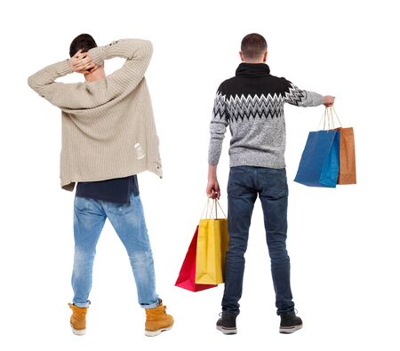 back view of two man with shopping bags. backside view of person. Rear view people collection. Isolated over white background.の写真素材