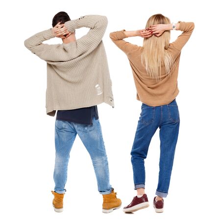 Back view of couple in sweater. beautiful friendly girl and guy together. Rear view people collection. backside view of person. Isolated over white background.の写真素材