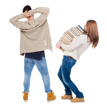 Back view of couple in sweater. beautiful friendly girl and guy together. Rear view people collection. backside view of person. Isolated over white background.の写真素材