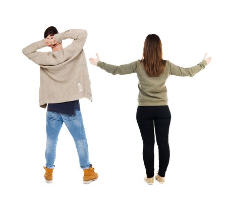 Back view of couple in sweater. beautiful friendly girl and guy together. Rear view people collection. backside view of person. Isolated over white background.の写真素材