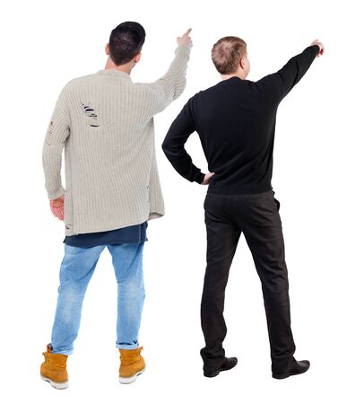 Back view of two man in sweater pointing. Rear view people collection. backside view of person. Isolated over white background.の写真素材
