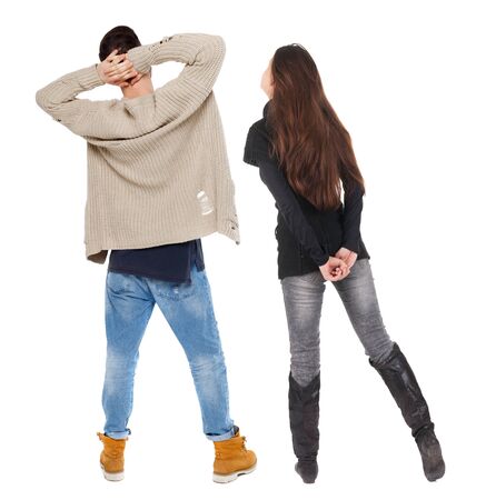 Back view of couple in sweater. beautiful friendly girl and guy together. Rear view people collection. backside view of person. Isolated over white background.の写真素材