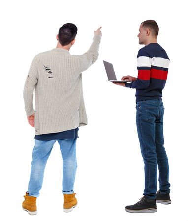 Back view of two man in sweater pointing. Rear view people collection. backside view of person. Isolated over white background.の写真素材