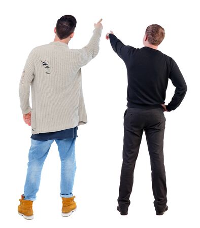 Back view of two man in sweater pointing. Rear view people collection. backside view of person. Isolated over white background.の写真素材