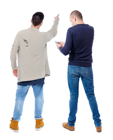 Back view of two man in sweater with mobile phone. Rear view people collection. backside view of person. Isolated over white background.の写真素材