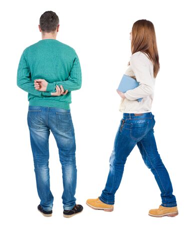 Back view of couple in sweater. beautiful friendly girl and guy together. Rear view people collection. backside view of person. Isolated over white background.の写真素材