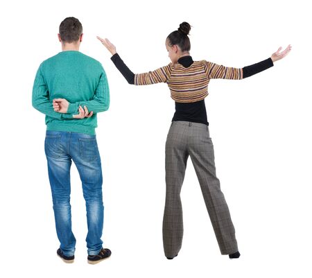 Back view of couple in sweater. beautiful friendly girl and guy together. Rear view people collection. backside view of person. Isolated over white background.の写真素材