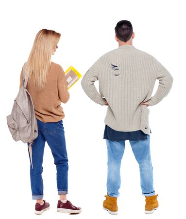 Back view of couple in sweater. beautiful friendly girl and guy together. Rear view people collection. backside view of person. Isolated over white background.の写真素材