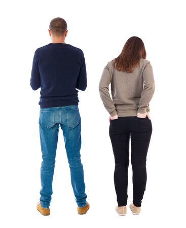 Back view of couple in sweater. beautiful friendly girl and guy together. Rear view people collection. backside view of person. Isolated over white background.の写真素材