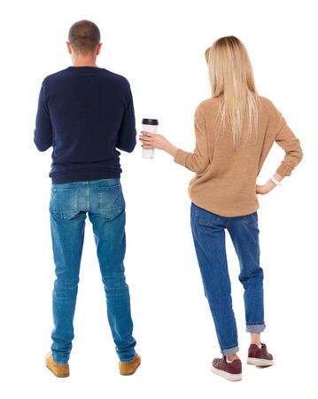 Back view of couple in sweater. beautiful friendly girl and guy together. Rear view people collection. backside view of person. Isolated over white background.の写真素材