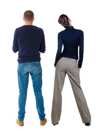 Back view of couple in sweater. beautiful friendly girl and guy together. Rear view people collection. backside view of person. Isolated over white background.の写真素材