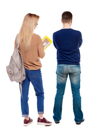 Back view of couple in sweater. beautiful friendly girl and guy together. Rear view people collection. backside view of person. Isolated over white background.の写真素材