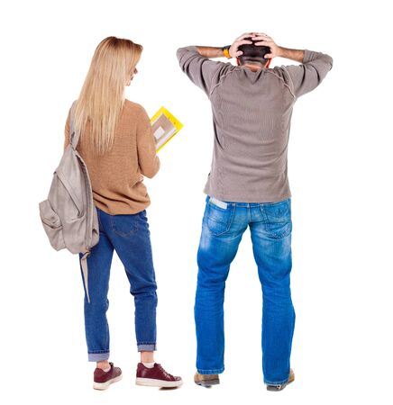 Back view of couple in sweater. beautiful friendly girl and guy together. Rear view people collection. backside view of person. Isolated over white background.の写真素材
