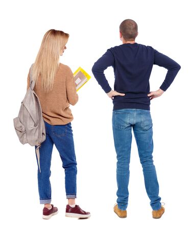 Back view of couple in sweater. beautiful friendly girl and guy together. Rear view people collection. backside view of person. Isolated over white background.の写真素材