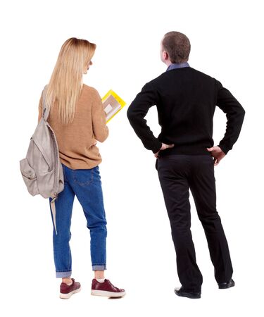 Back view of couple in sweater. beautiful friendly girl and guy together. Rear view people collection. backside view of person. Isolated over white background.の写真素材
