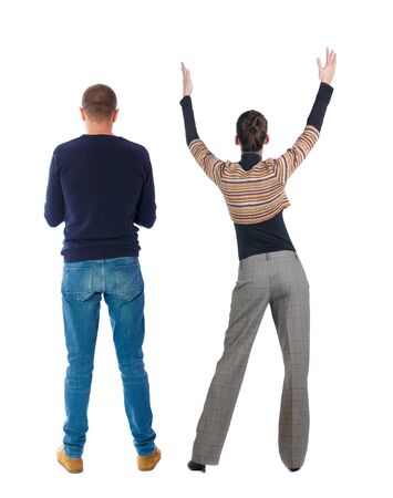Back view of couple in sweater. beautiful friendly girl and guy together. Rear view people collection. backside view of person. Isolated over white background.の写真素材