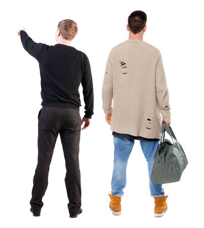 Back view of two man in sweater pointing. Rear view people collection. backside view of person. Isolated over white background.の写真素材