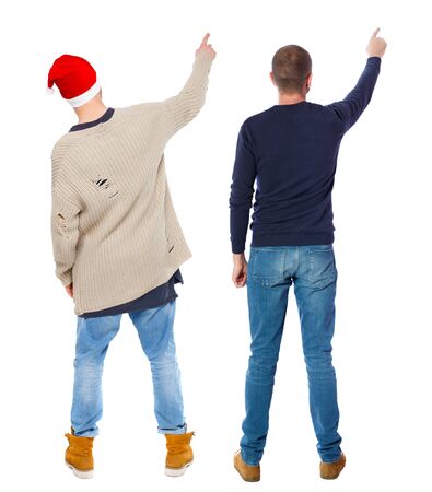 Back view of two man in sweater pointing. Rear view people collection. backside view of person. Isolated over white background.の写真素材