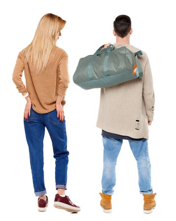 Back view of couple in sweater. beautiful friendly girl and guy together. Rear view people collection. backside view of person. Isolated over white background.の写真素材