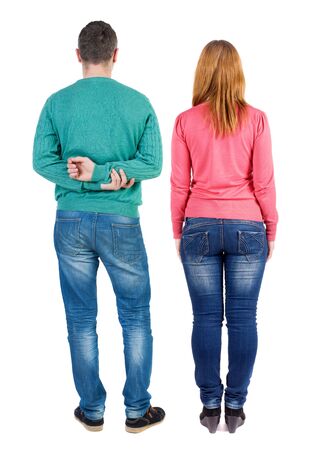 Back view of couple in sweater. beautiful friendly girl and guy together. Rear view people collection. backside view of person. Isolated over white background.の写真素材