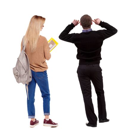 Back view of couple in sweater. beautiful friendly girl and guy together. Rear view people collection. backside view of person. Isolated over white background.の写真素材