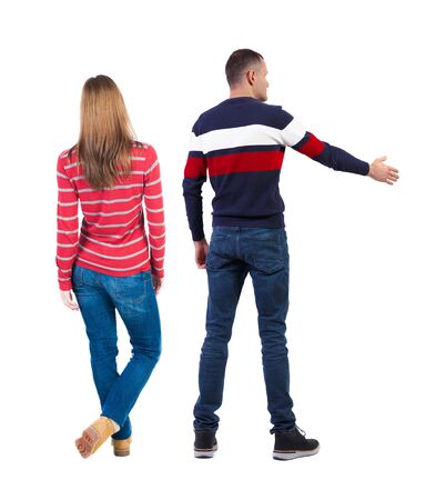 Back view of couple in sweater. beautiful friendly girl and guy together. Rear view people collection. backside view of person. Isolated over white background.の写真素材