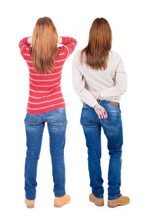 Back view of two woman in sweater. beautiful friendly girl and guy together. Rear view people collection. backside view of person. Isolated over white background.の写真素材