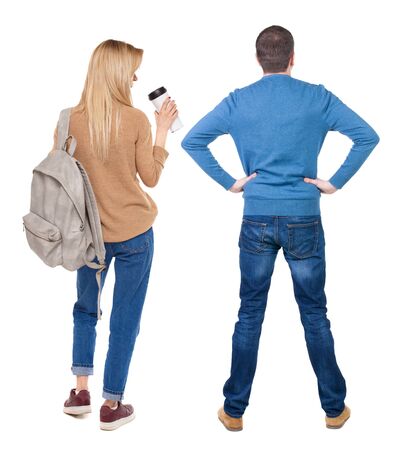 Back view of couple in sweater. beautiful friendly girl and guy together. Rear view people collection. backside view of person. Isolated over white background.の写真素材
