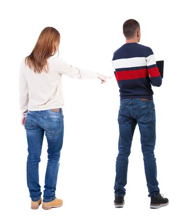 Back view of couple in sweater. beautiful friendly girl and guy together. Rear view people collection. backside view of person. Isolated over white background.の写真素材