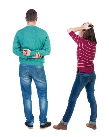 Back view of couple in sweater. beautiful friendly girl and guy together. Rear view people collection. backside view of person. Isolated over white background.の写真素材