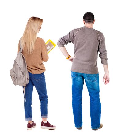 Back view of couple in sweater. beautiful friendly girl and guy together. Rear view people collection. backside view of person. Isolated over white background.の写真素材
