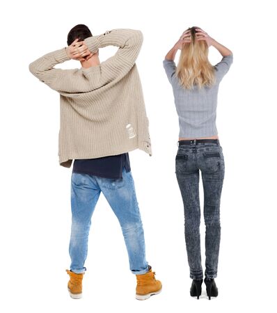 Back view of couple in sweater. beautiful friendly girl and guy together. Rear view people collection. backside view of person. Isolated over white background.の写真素材