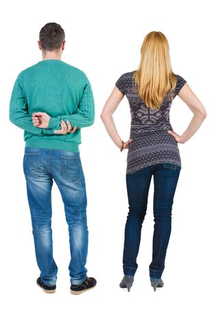 Back view of couple in sweater. beautiful friendly girl and guy together. Rear view people collection. backside view of person. Isolated over white background.の写真素材