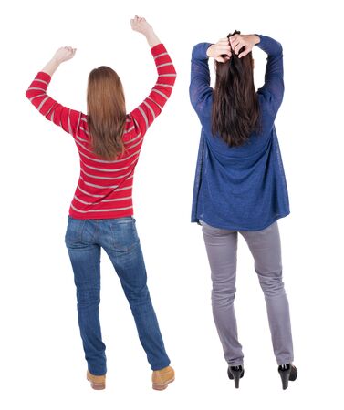 Back view of two woman in sweater. beautiful friendly girl and guy together. Rear view people collection. backside view of person. Isolated over white background.の写真素材