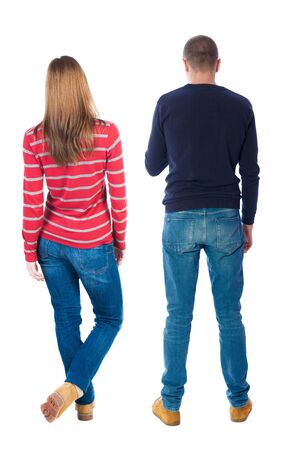 Back view of couple in sweater. beautiful friendly girl and guy together. Rear view people collection. backside view of person. Isolated over white background.の写真素材
