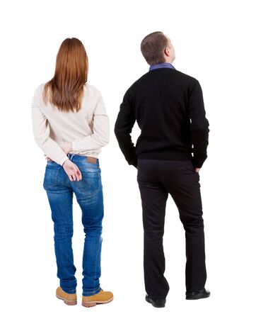 Back view of couple in sweater. beautiful friendly girl and guy together. Rear view people collection. backside view of person. Isolated over white background.の写真素材