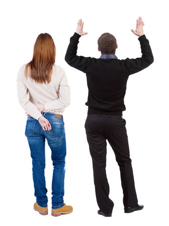 Back view of couple in sweater. beautiful friendly girl and guy together. Rear view people collection. backside view of person. Isolated over white background.の写真素材