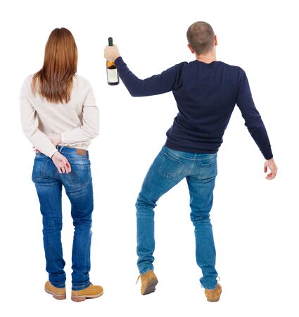 Back view of couple in sweater. beautiful friendly girl and guy together. Rear view people collection. backside view of person. Isolated over white background.の写真素材