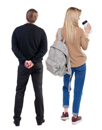 Back view of couple in sweater. beautiful friendly girl and guy together. Rear view people collection. backside view of person. Isolated over white background.の写真素材