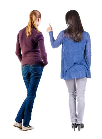 Back view of couple couple in sweater showing thumbs up. beautiful friendly girl and guy together. Rear view people collection. backside view of person. Isolated over white background.の写真素材
