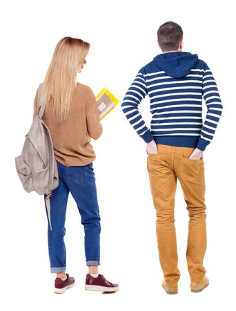 Back view of couple in sweater. beautiful friendly girl and guy together. Rear view people collection. backside view of person. Isolated over white background.の写真素材