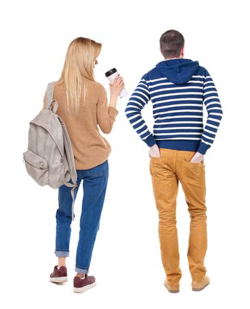 Back view of couple in sweater. beautiful friendly girl and guy together. Rear view people collection. backside view of person. Isolated over white background.の写真素材